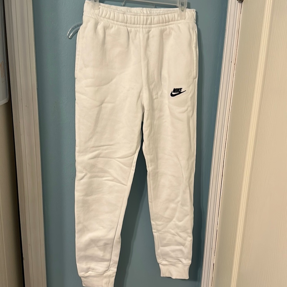 Whit nike sweatpants size small. Never worn